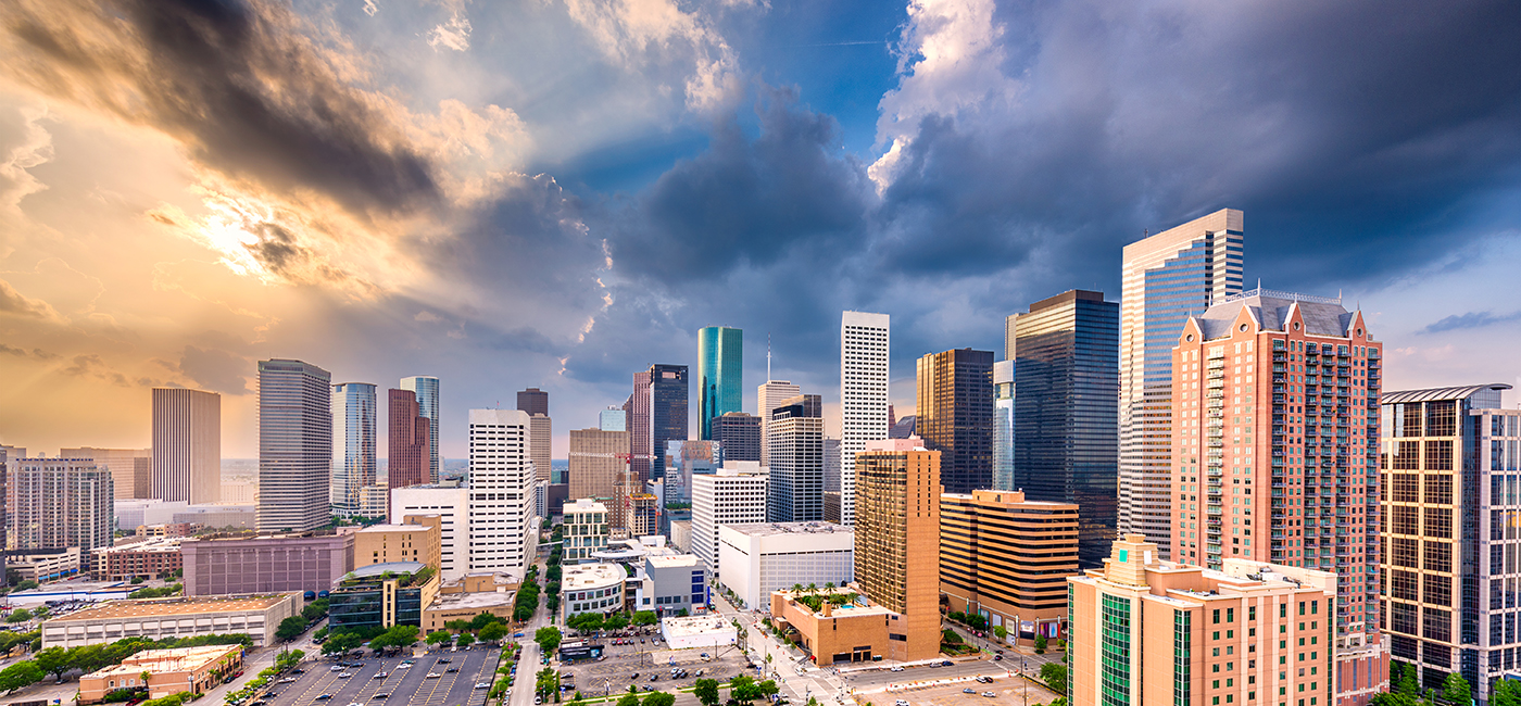 Image of the houston skyline with colourful dramatic sweeping clouds