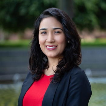 Portrait of Jeanette Villarreal in a red shirt and black blazer
