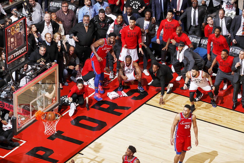 TORONTO, CANADA - MAY 12: Kawhi Leonard #2 of the Toronto Raptors watches after hitting the game-winning buzzer beater shot against the Philadelphia 76ers to win Game Seven of the Eastern Conference Semifinals of the 2019 NBA Playoffs on May 12, 2019 at the Scotiabank Arena in Toronto, Ontario, Canada.